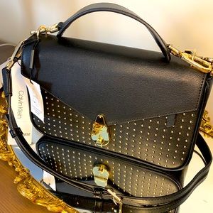 Calvin Klein statement series locking shoulder bag